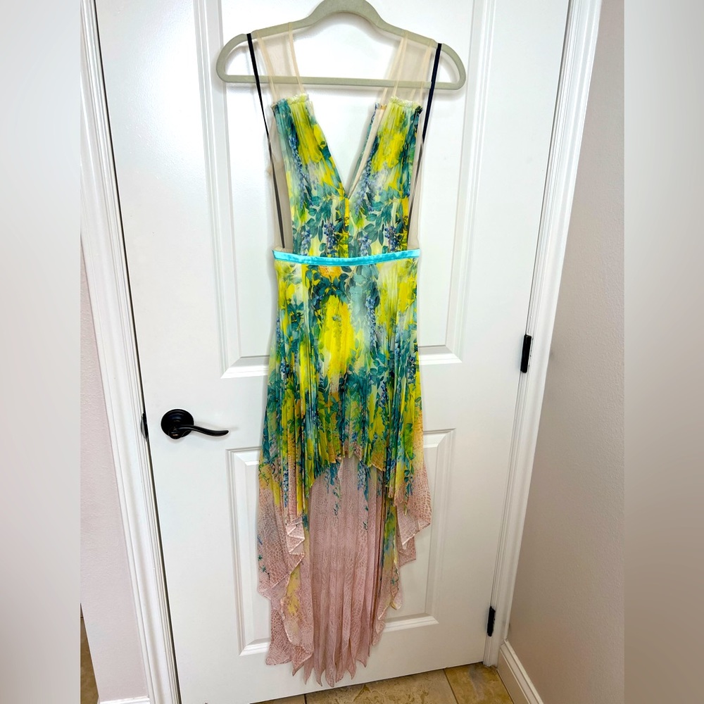 Beautiful cut out summer dress by Bebe. I love this dress so much! Worn one time